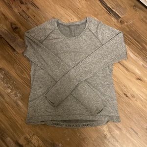 Gray, long sleeve, swiftly tech, worn a couple times, size 10